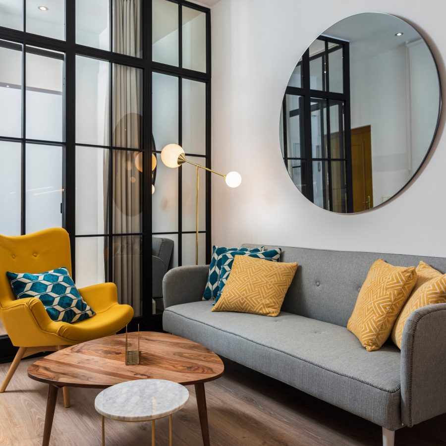 Colorful,And,Cozy,Living,Room,With,A,Designer,Armchair,And